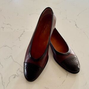 Leather flats .